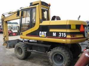 Аренда колесного экскаватора Caterpillar M315   